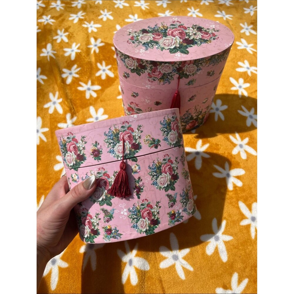 Two Vintage Pink Floral Print Oval Shaped Storage Vanity Boxes with Red Tassels